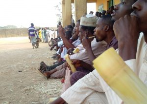 Image: My Generation: Football spectators snacking on sugarcane at San Siro Stadium, Kaduna, Nigeria, Digital photograph, Ishaq Mohammed Bello