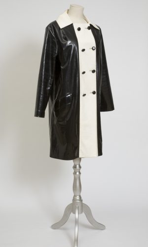 Mary Quant black and white ‘Op-Art’ raincoat, circa 1964-8, PVC with black rayon lining © Bristol Culture